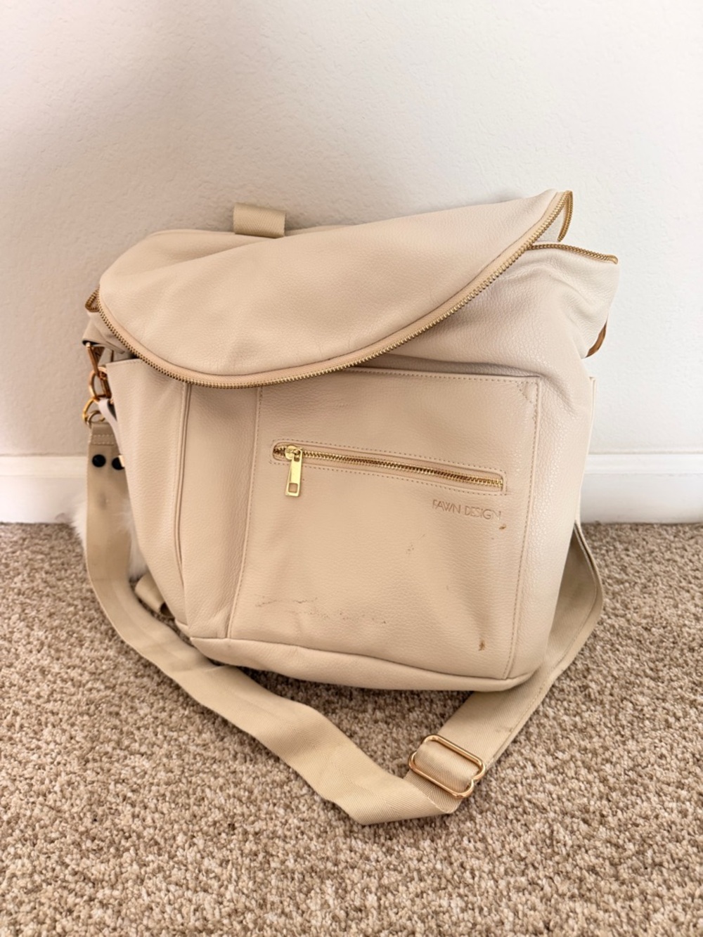 Fawn Design Cream Crossbody Diaper Bag with Gold Hardware